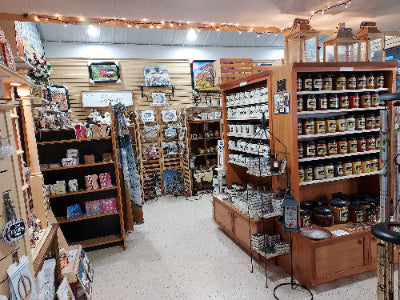 Gift Nook interior with shelves displaying various products and decor items.