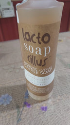 Seven‑second video showing Elemental Wellness Frankincense Liquid Castile Soap being pumped into a hand, creating a silky, plant‑based lather. The amber bottle and label are clearly visible, highlighting the natural, palm‑oil‑free formula.