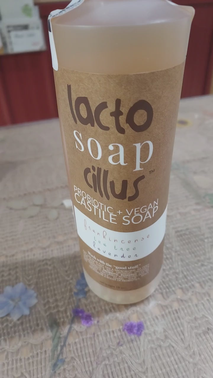 Seven‑second video showing Elemental Wellness Frankincense Liquid Castile Soap being pumped into a hand, creating a silky, plant‑based lather. The amber bottle and label are clearly visible, highlighting the natural, palm‑oil‑free formula.